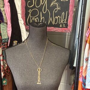 Elegant Gold Tassel Necklace with clear stones